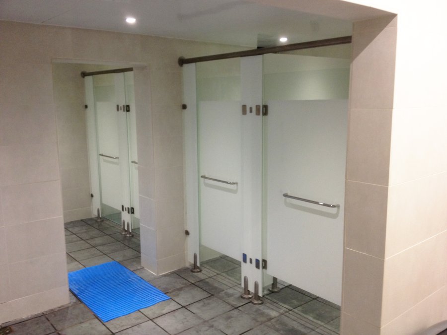 Enclosures and booths for toilets and bathrooms